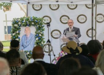 Dr. Carlisle speaking during Dr. Wilbert C. Jordan's memorial.