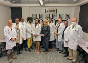 Group photo of CDU Faculty with HRSA Administrator Carole Johnson after the roundtable discussion.