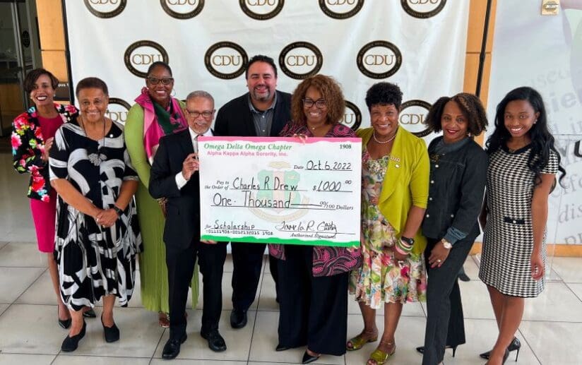 Group photo of the check presentation with representatives from CDU and Alpha Kappa Alpha Sorority, Inc., Omega Delta Omega Chapter