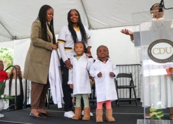 BSN student being coated by her loved ones