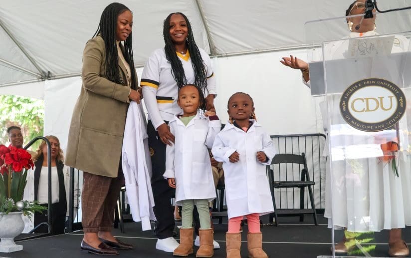 BSN student being coated by her loved ones