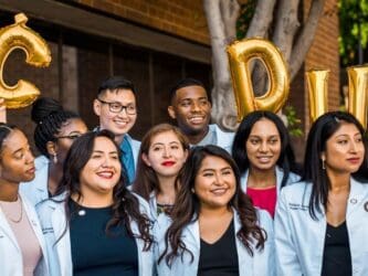 CDU students in white coats