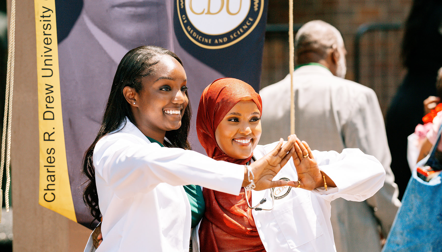 CDU students celebrating their white coat moment